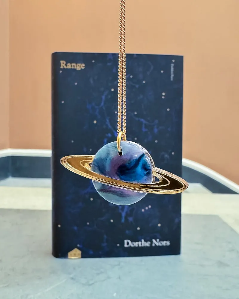 Win a Kate Rowland Saturn Necklace & Hardback Copy of Dorthe Nors’ Novel