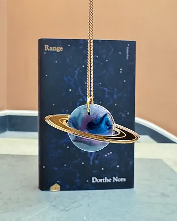 Prize image for Win a Kate Rowland Saturn Necklace & Hardback Copy of Dorthe Nors’ Novel