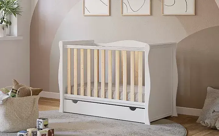 Win a Willow Sleigh Cot Bed with Aloe Vera Mattress