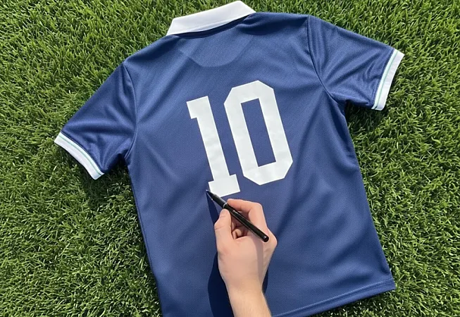 Win a mystery signed football shirt worth £335