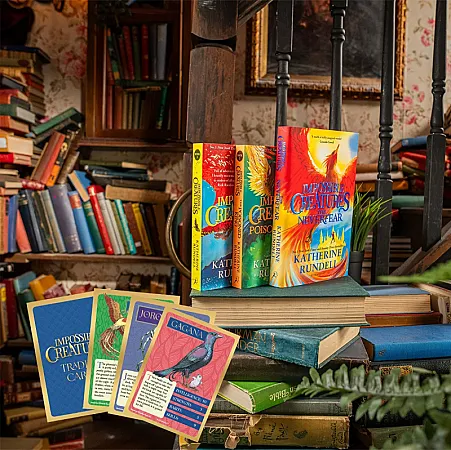 Win a set of the 3 books in the Impossible Creatures series plus a pack of trading cards